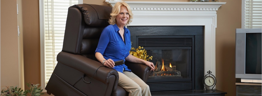 A woman using a lift chair.