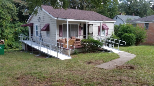 a wheelchair ramp leading into a home