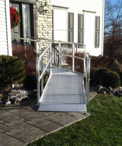 an aluminum ramp leading into a home