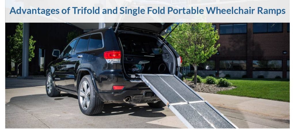 a folding wheelchair ramp on the back of a vehicle