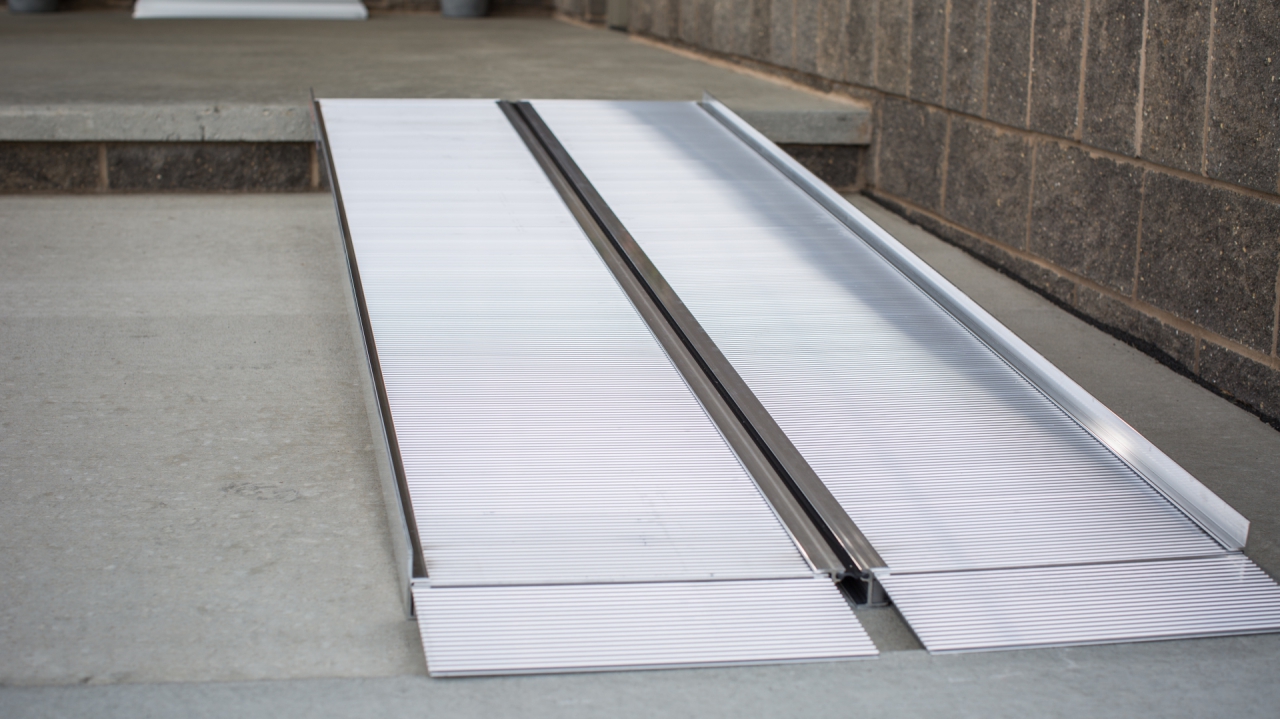 Singlefold ramp leading to a concrete slab