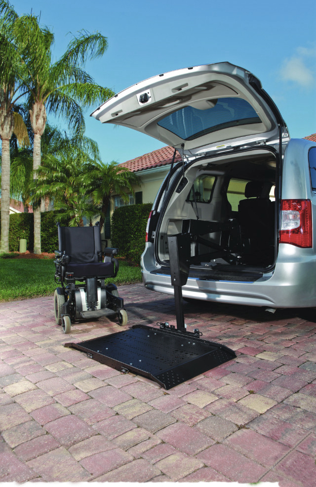 A van with a power lift attached