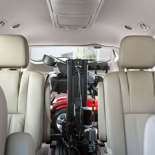 A platform lift inside a car