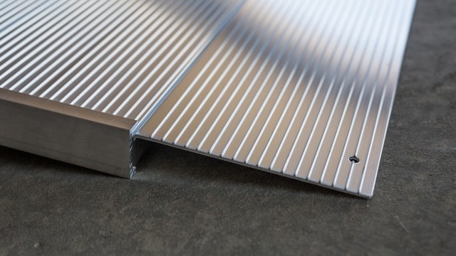 Angled entry ramp with stripes