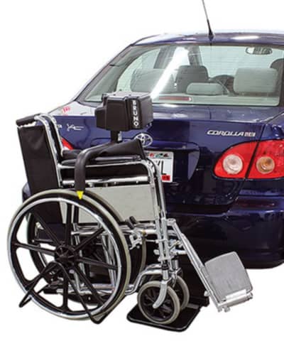 The Bruno Back Saver lifting a wheelchair into a car