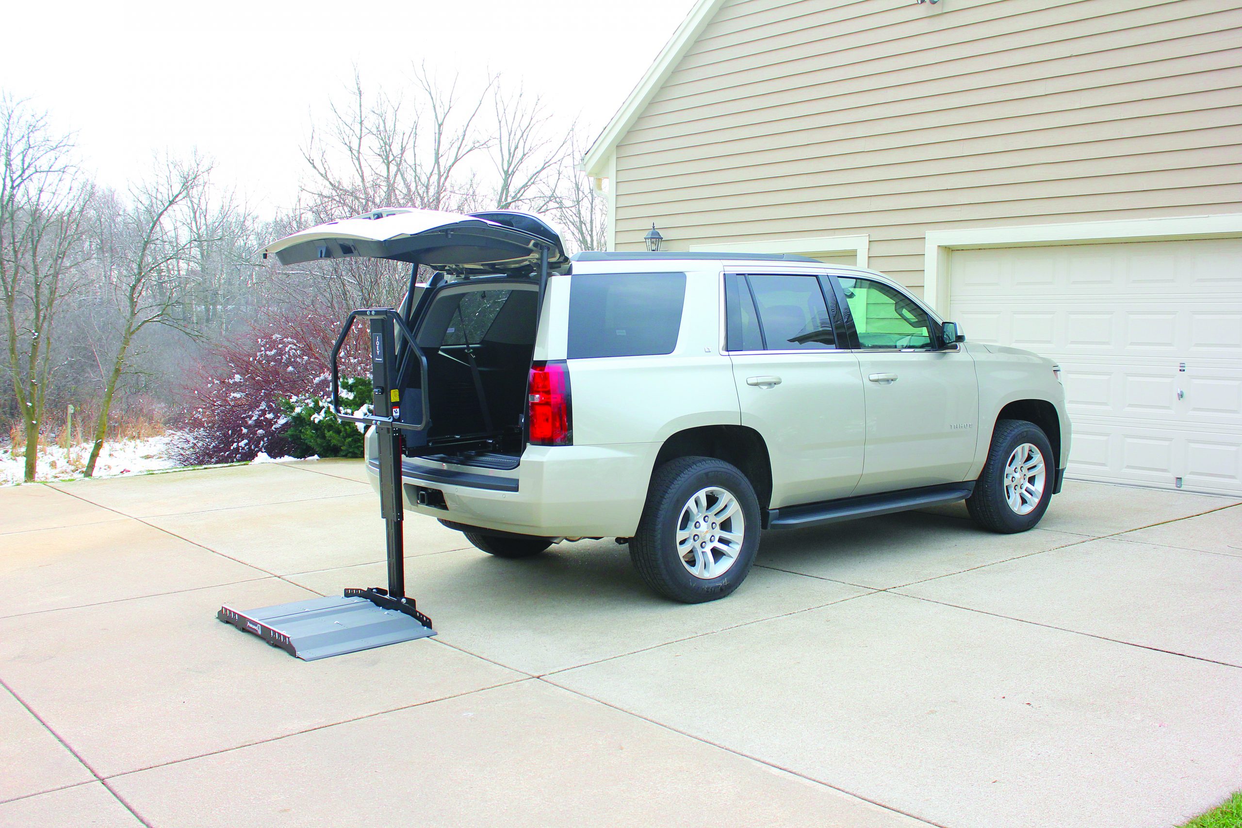 A vehicle lift leading into a car