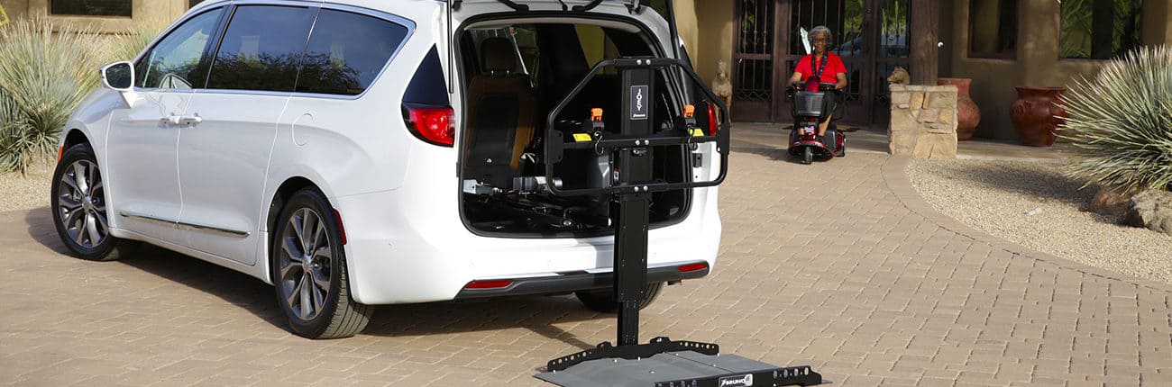 A vehicle lift leading into a car