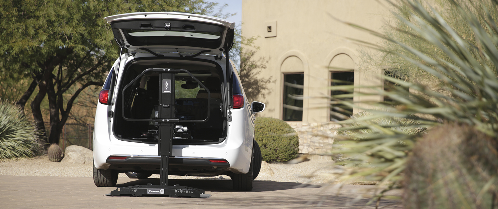 A vehicle lift leading into a car