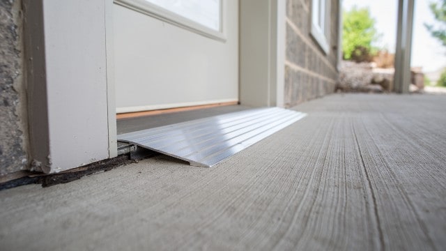 Modular entry ramp in front of cement