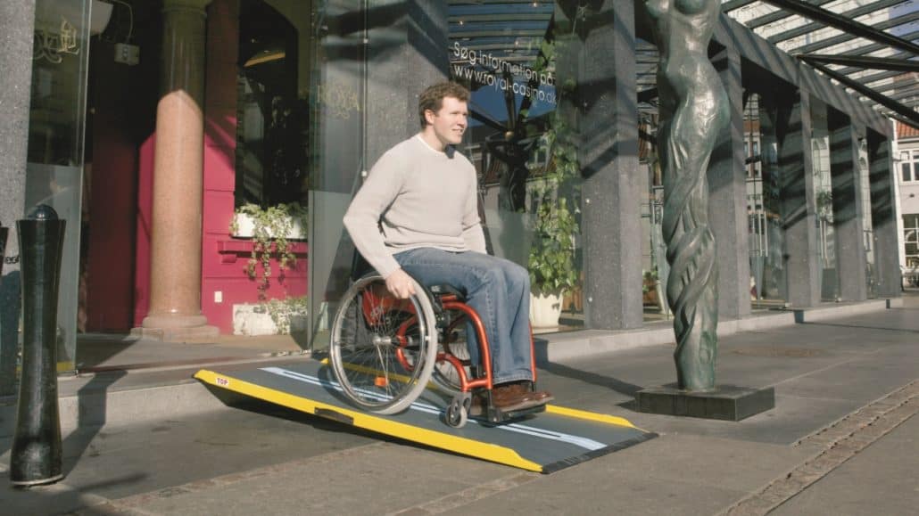 Graphite Fiber Ramp with a man in a wheelchair on it