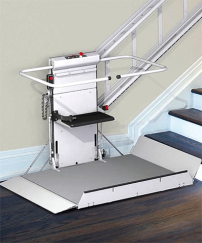 A platform lift leading up stairs
