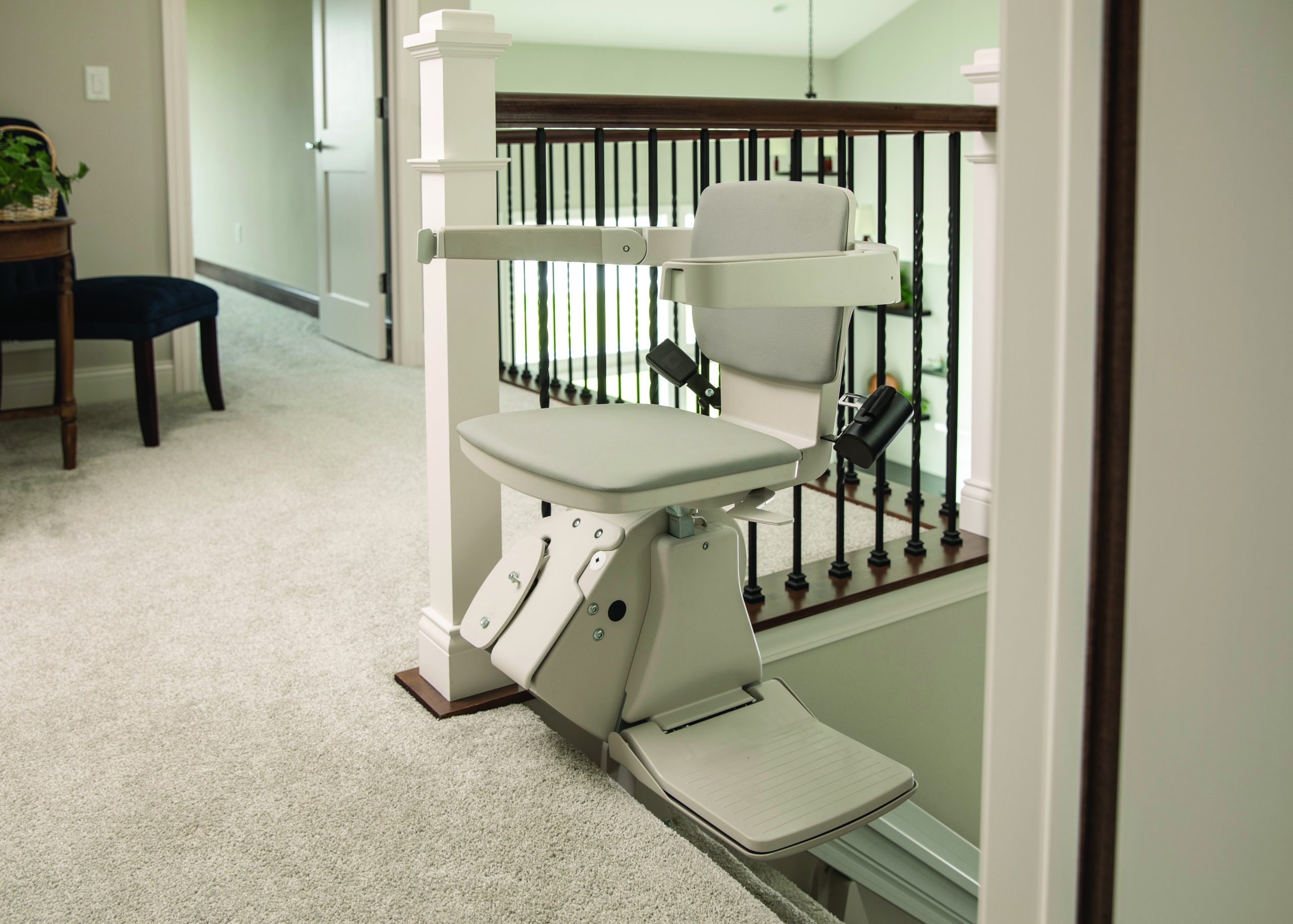 Bruno elan stair lift at top of stairs