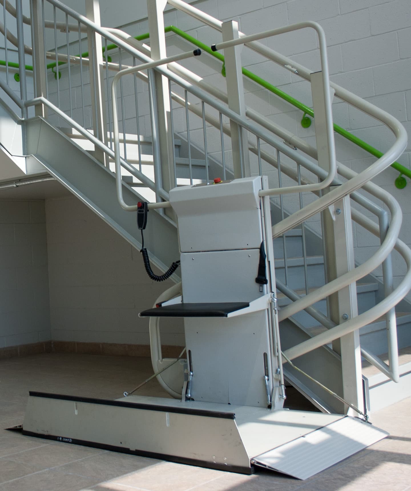 A platform lift leading up stairs