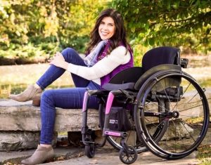 Wheelchair ballroom dancer. Paralympic swimmer. Model. Dog mom.
